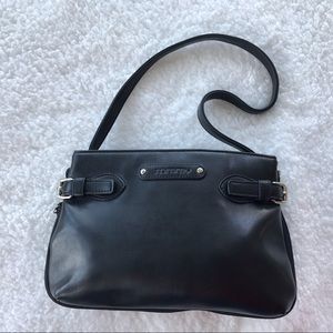 Tommy Hilfiger black purse with flannel inset.
